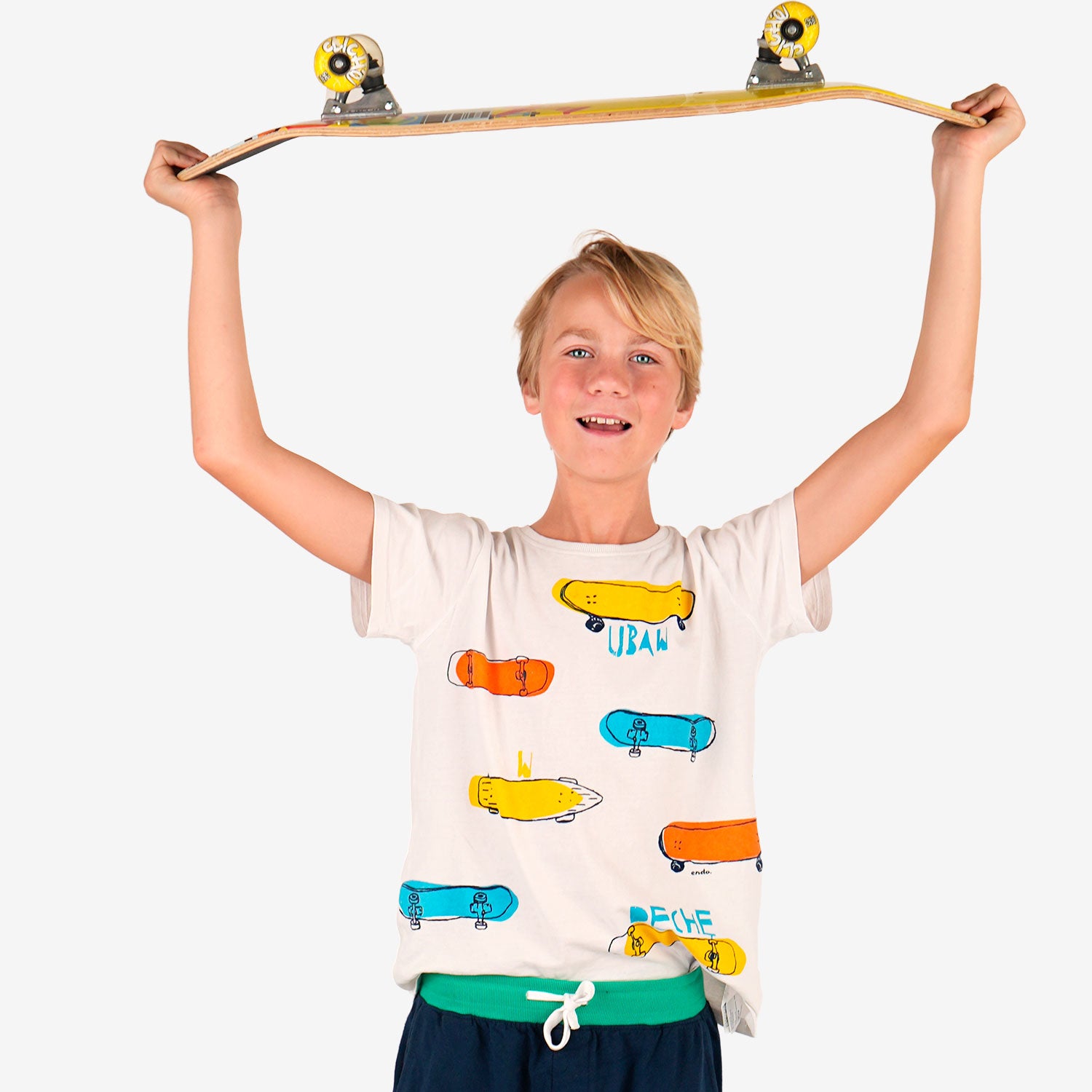 Boy's short-sleeved T-shirt with a skateboard motif, ages 9-13