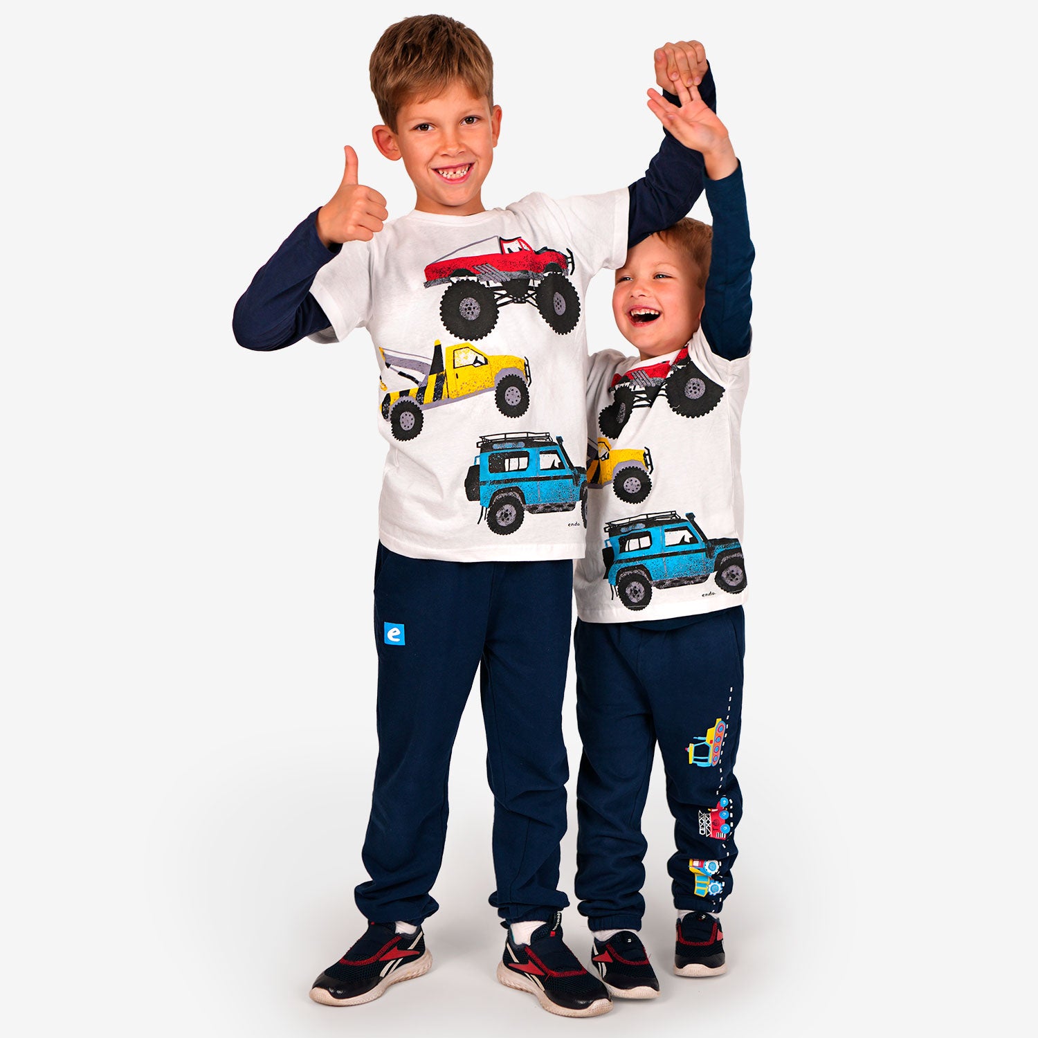 Boy's tracksuit bottoms with vehicles, navy blue, 2-7 years old
